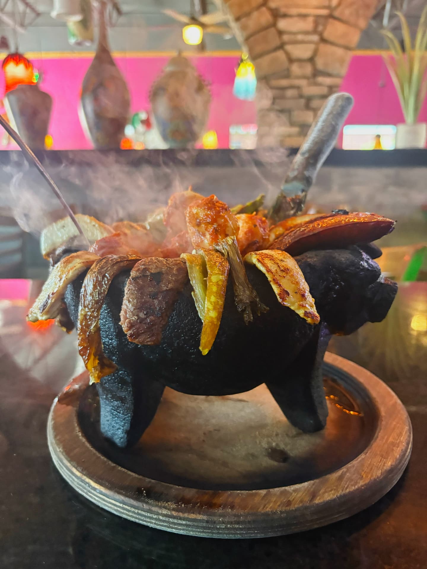 Super Molcajete served sizzling at El Molcajete Cantina & Grill